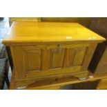 18th century style pale oak coffwr bach, having three fielded panels on a projecting base and