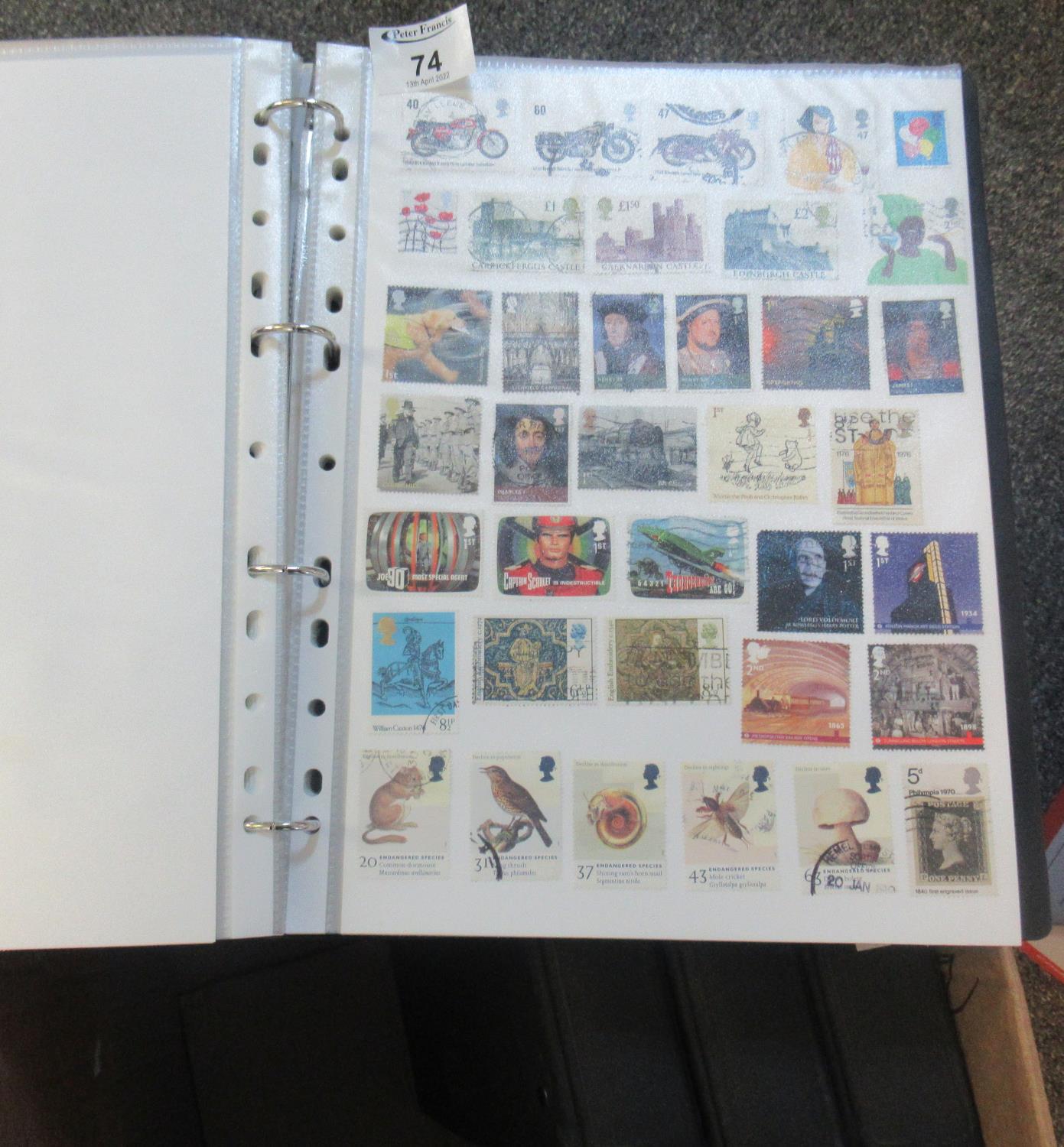 All world collection on pages in four large black binders, Many 100s of stamps, mostly unused. (B.P.