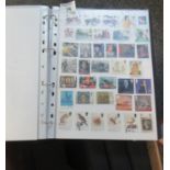 All world collection on pages in four large black binders, Many 100s of stamps, mostly unused. (B.P.