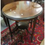 Edwardian mahogany inlaid lamp table of circular form with under tier. (B.P. 21% + VAT)