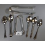 Collection of silver tea spoons and sugar nips. (B.P. 21% + VAT)