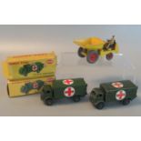 Two Dinky toys 626 military ambulances, both in original boxes, one probably a reproduction.