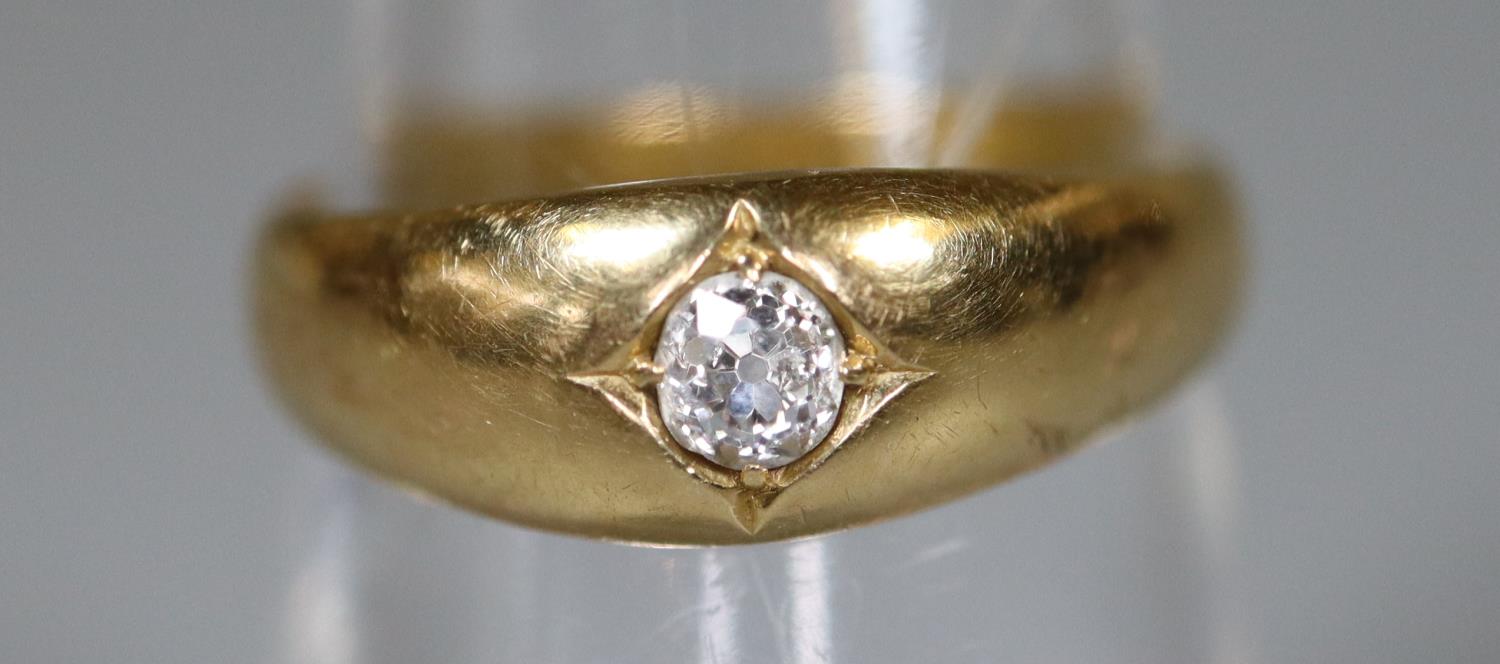 18ct gold diamond solitaire ring. The old cut diamond in gypsy setting. Ring size L&1/2. Approx