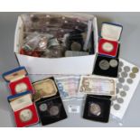 Box of assorted foreign and British coins and bank notes including a large collection of QEII crowns