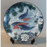 Japanese porcelain charger overall decorated with koi carp. 20th century. Character marks to