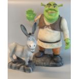 Two novelty plastic film characters, Shrek and Donkey. (2) (B.P. 21% + VAT)