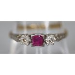 An 18ct gold platinum mounted ruby and diamond ring. Ring size P. Approx weight 2.5 grams. (B.P. 21%