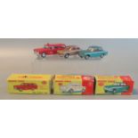 Three vintage Dinky toys Diecast model vehicles in original boxes to include 134 Triumph Vitesse,