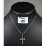 9ct gold cross pendant on a 9ct gold chain. Approx weight 4.2 grams. (B.P. 21% + VAT)