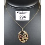 9ct gold and garnet pendant on 9ct gold chain. Approx weight 10 grams. (B.P. 21% + VAT)