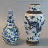 Two probably 19th century Chinese porcelain vases, one of baluster form with underglaze cobalt
