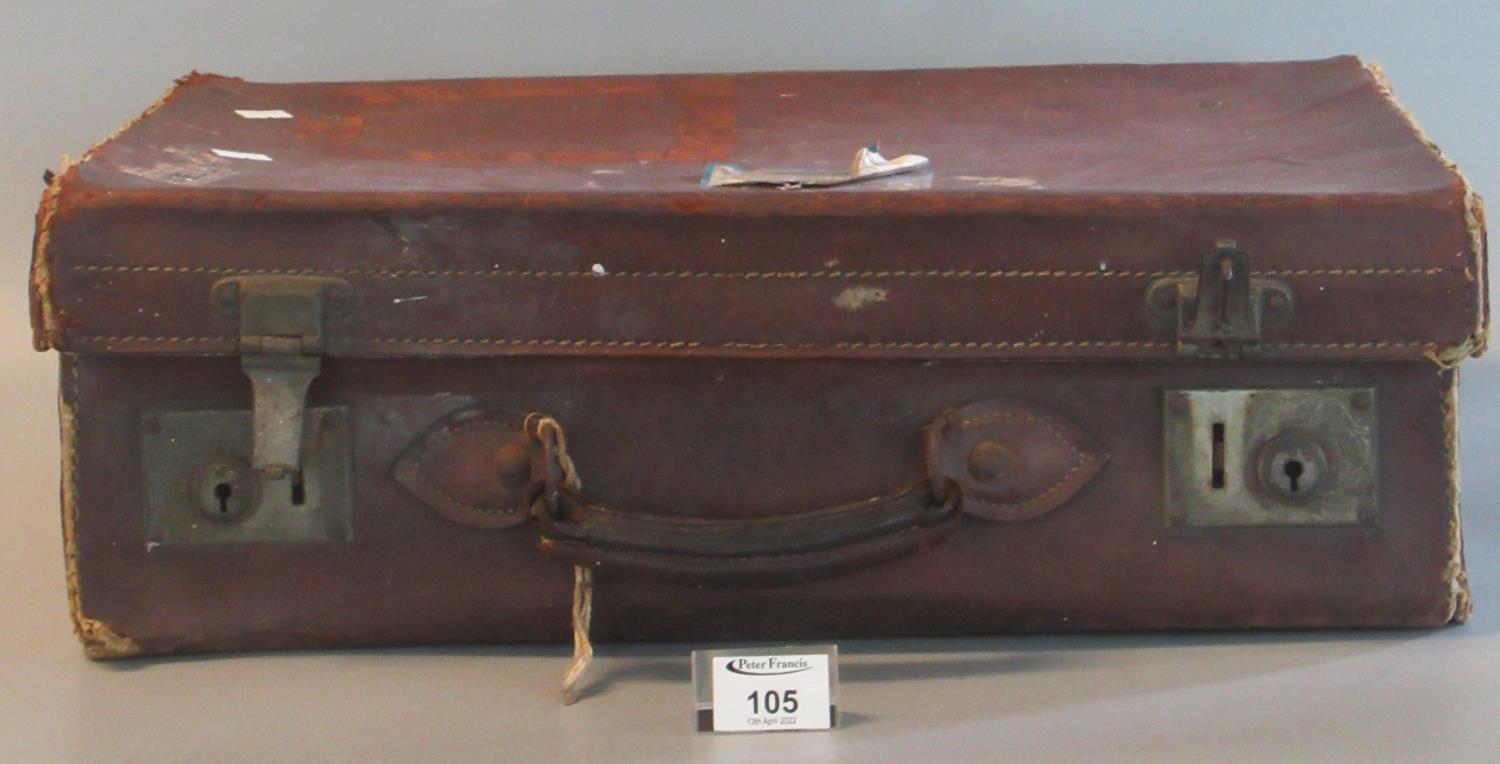 Leather suitcase containing assorted items including army medical corps shield, plaque,