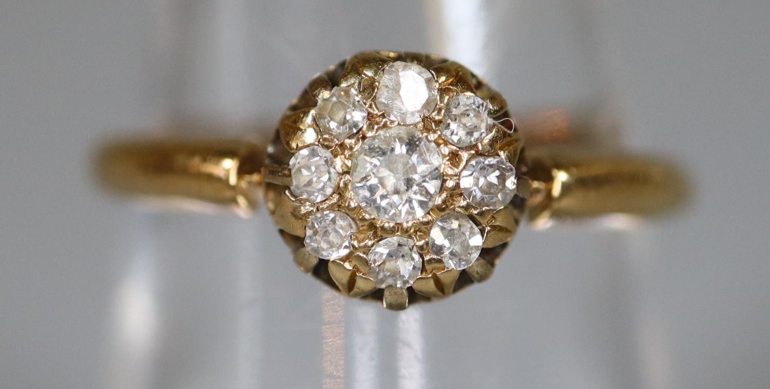 18ct gold and diamond cluster ring. Ring size O. Approx weight 2.6 grams. (B.P. 21% + VAT)