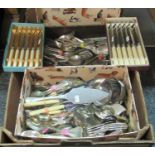 Box containing a large selection of cutlery including bone handle knives, ladles, soup spoons,