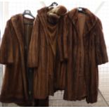 Three vintage fur coats, one marked Harrods to the inside, together with a fur hat. (4) (B.P.