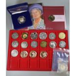 Box of assorted coins to include; Millennium £5 silver proof crowns, £5 Crowns, £2 Crowns, Winston