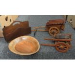 Box of assorted wooden items, to include horse carts, turned treen bowl, stationary rack with hand