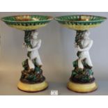 Pair of 19th century Wedgwood majolica comports, the pierced basket with weave design above a