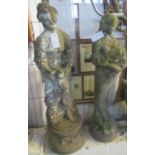 2 similar weathered composition garden figures - girl with flowers and girl with dove. approx.