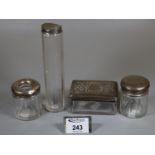 Collection of silver topped glass dressing table jars, one with pierced lid, the silver 2.14oz