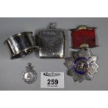 Silver vesta case, silver napkin ring, a Buffulo Earl of Jersey Lodge medal and a silver table
