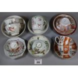 Group of assorted English and Chinese Oriental style tea cups, tea bowls, and saucers, various