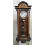 Early 20th Century walnut and ebonised 2 train Vienna type wall clock with pendulum and 2