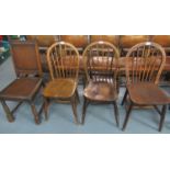 Set of three elm hoop and spindle-back kitchen chairs on moulded seats with turned legs together