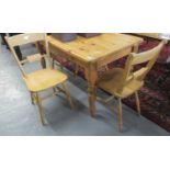 Modern pine kitchen table of rectangular form on baluster turned legs together with a set of 4 beech