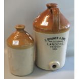 E Spooner & sons. of Landore, Swansea large stoneware flagon, together with a smaller flagon lacking