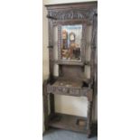 Late Victorian carved oak mirror back hall stand. (B.P. 21% + VAT)