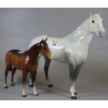 Beswick dapple grey study of a horse, together with another Beswick horse. (2) (B.P. 21% + VAT)