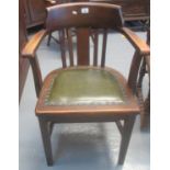 Early 20th century oak office type elbow chair with slatted back, open arms and padded seat. (B.P.