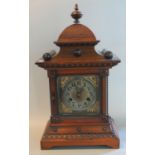 German early 20th century walnut two train architectural mantel clock. 46cm high approx. (B.P. 21% +