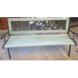 Modern metal and wooden two seater floral decorated garden seat. (B.P. 21% + VAT