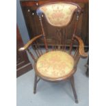 Early 20th century stained beech elbow chair with padded back and circular padded seat. (B.P.