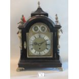 19th century three train ebonised bracket clock, the case with urn finials and term mounts, loop