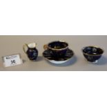 Group of Spode dark blue ground gilded and enamelled miniature items to include jug and basin marked