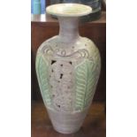 Large modern stone ware baluster shaped pierced and relief decorated jar. (B.P. 21% + VAT)