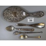 A silver backed mirror, silver handled shoe horn and boot hook, a silver handled preserve spoon