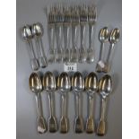 A set of six Victorian silver forks, six dessert spoons and four teaspoons. Maker RS, London 1888.