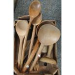 Box of treen to include cawl and other spoons, dough cutter, butter moulds, etc. (B.P. 21% + VAT)
