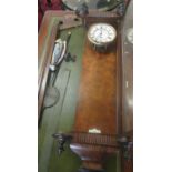 Early 20th Century walnut single train Vienna type wall clock with pendulum, in distressed