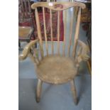 Elm and Beech curve and spindle back open armchair on circular moulded seat. (B.P. 21% + VAT)