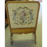 Early 20th century oak framed tapestry floral and foliate fire screen on shaped legs. (B.P. 21% +