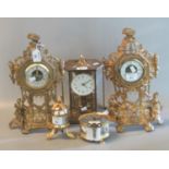 Group of assorted modern brass and gilt metal clocks various. Include 100 day perpetual motion type,