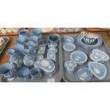 Two Trays of blue and white Wedgwood Jasperware comprising: vases, pin dishes lidded trinket