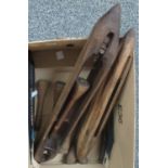 Box containing two woollen mill shuttles, wooden bobbins, etc. (12 in total). (B.P. 21% + VAT)