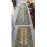 Collection of 3 middle eastern design runners having central medallion designs together with another