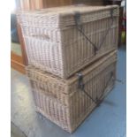 Pair of wicker two handled laundry baskets with cast metal mounts and swing handles. (2) (B.P. 21% +